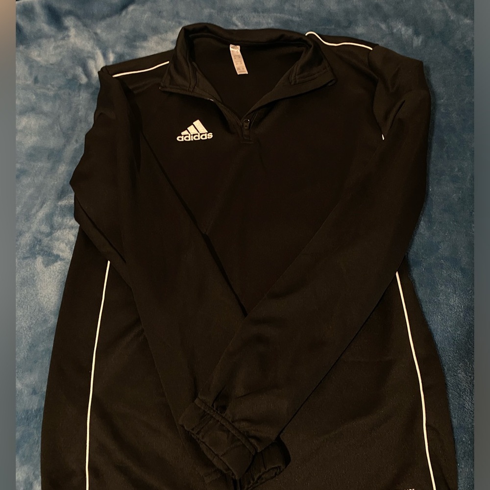 Adidas sweatshirt, black. It’s an XS but can also fit as small .